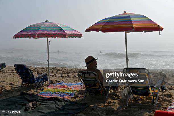 Hicham Anzer of Fairfax County, Virginia, on a hazy Monday morning on the beach in Ocean City, Maryland.