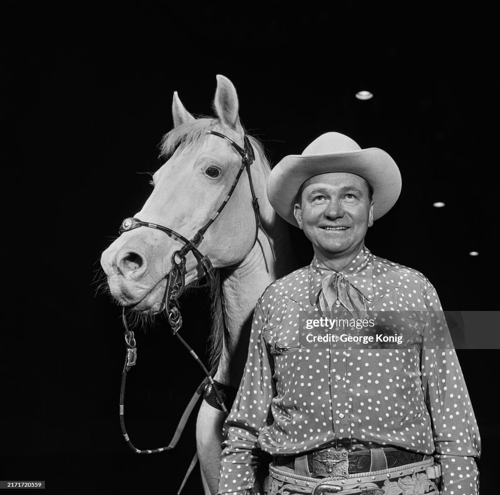 Alex Tex Ritter American singer and actor Tex Ritter posing with his horse White ...
