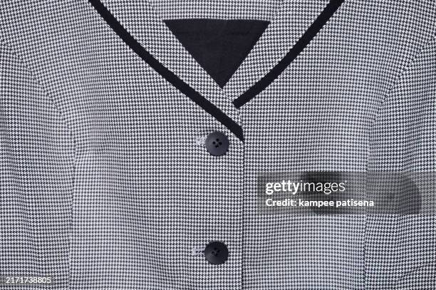 black and white houndstooth fabric with buttons - geblokte blazer stockfoto's en -beelden