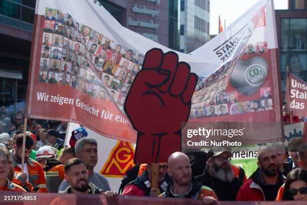 Labor union calls for thousands of steel workers to protest in front of Mercatorhall during the national steel summit in Duisburg, Germany, on...