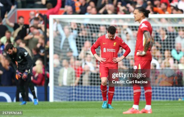 Andy Robertson of Liverpool looks dejected after Callum Hudson-Odoi of Nottingham Forest scores his team's first goal during the Premier League match...