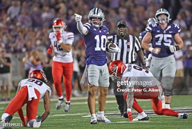 Wide receiver Keagan Johnson of the Kansas State Wildcats reacts after picking up a first down in the second half against the Arizona Wildcats at...