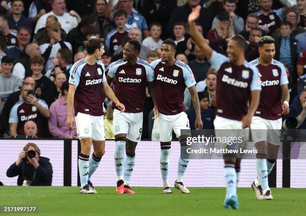Jhon Duran of Aston Villa celebrates scoring his team's third goal with teammate during the Premier League match between Aston Villa FC and Everton...