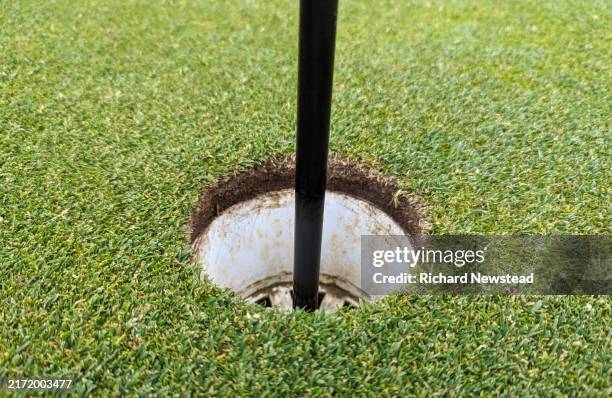 golf hole - hole stock pictures, royalty-free photos & images