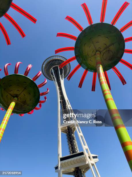 seattle space needle with whimsical flowers - seattle center stock pictures, royalty-free photos & images