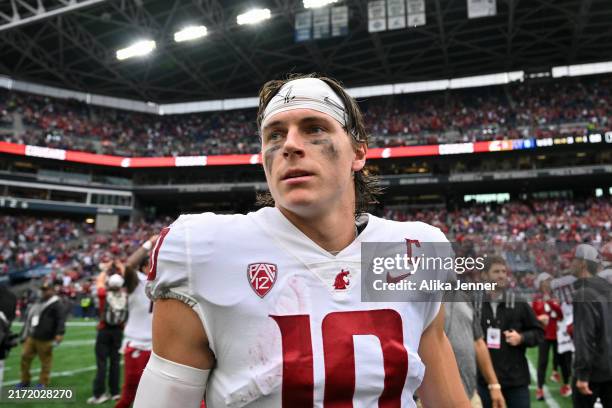 John Mateer of the Washington State Cougars looks on after the Boeing Apple Cup 2024 game against the Washington Huskies at Lumen Field on September...