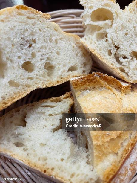 fresh artisan bread in a basket - galicia stock pictures, royalty-free photos & images
