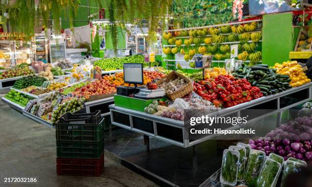empty greengrocer's shop - greengrocer stock pictures, royalty-free photos & images