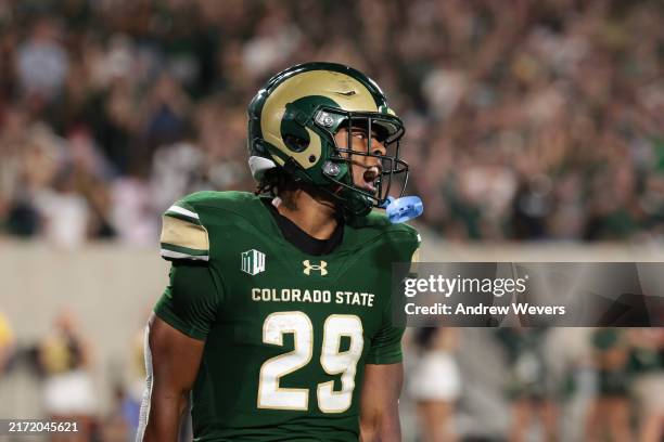 Justin Marshall of the Colorado State Rams reacts after scoring a touchdown during the fourth quarter against the Colorado Buffaloes at Canvas...