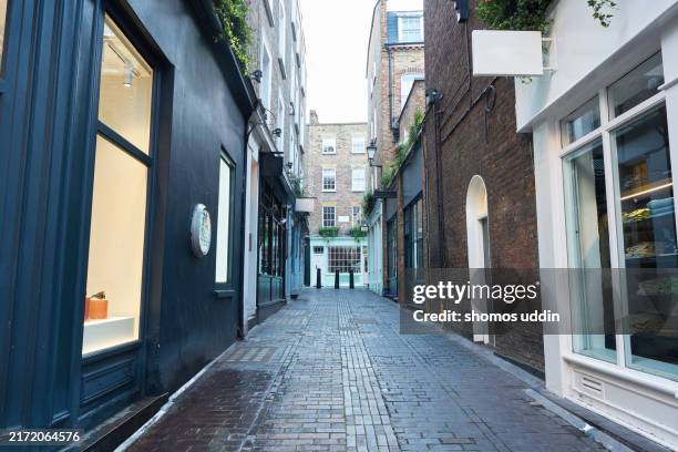 traditional shopping street in london west end - shop window stock pictures, royalty-free photos & images