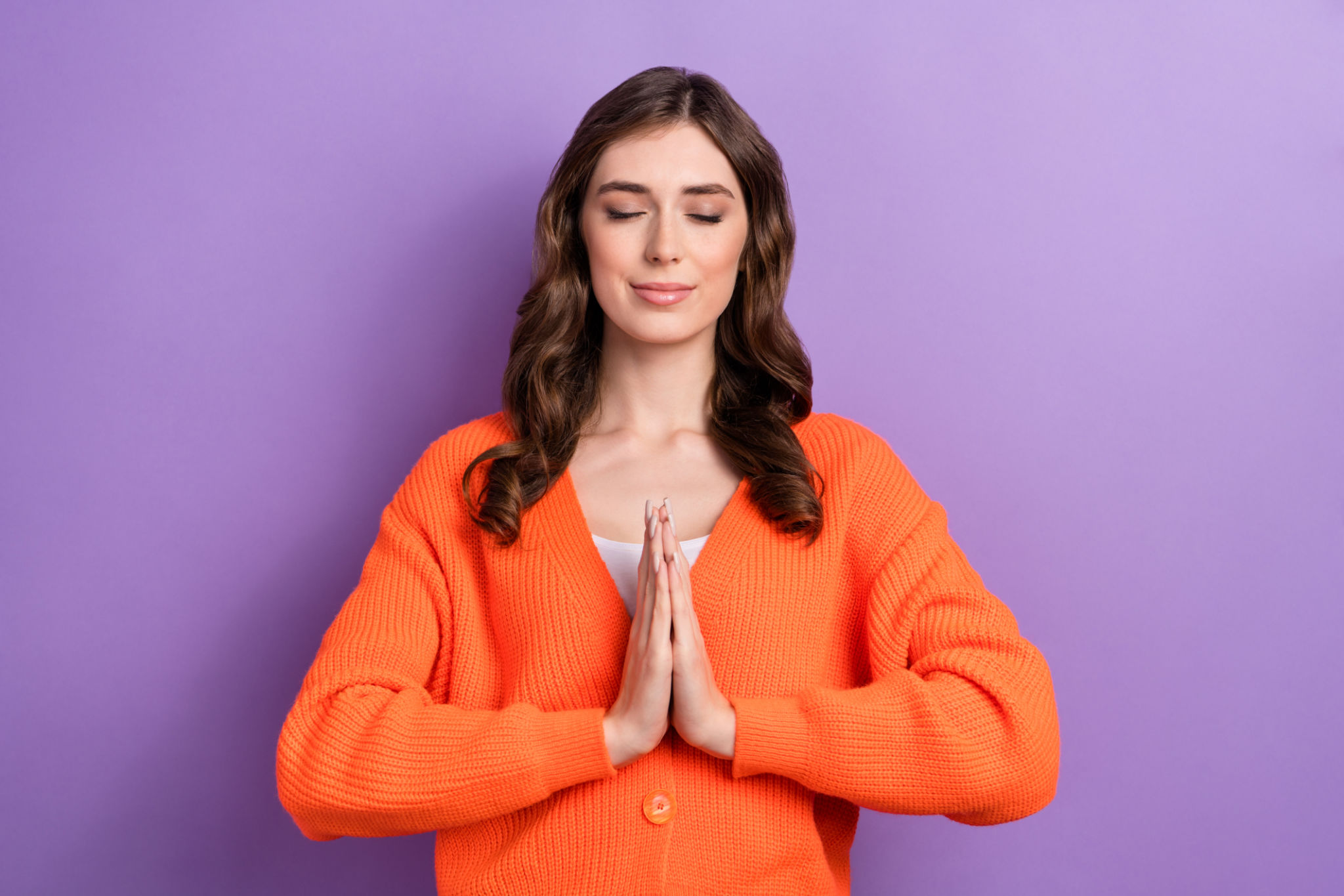 Photo of concentrated focused lady wear stylish clothes praying help Ukraine stop end war aggressor isolated on purple color background Photo of concentrated focused lady wear stylish clothes praying help Ukraine stop end war aggressor isolated on purple color background