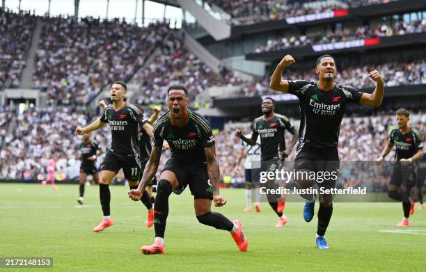 Gabriel of Arsenal celebrates scoring his team's first goal during the Premier League match between Tottenham Hotspur FC and Arsenal FC at Tottenham...