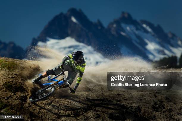 mountain biking the whistler mountain bike park in whistler,british columbia - whistler mountain stock pictures, royalty-free photos & images