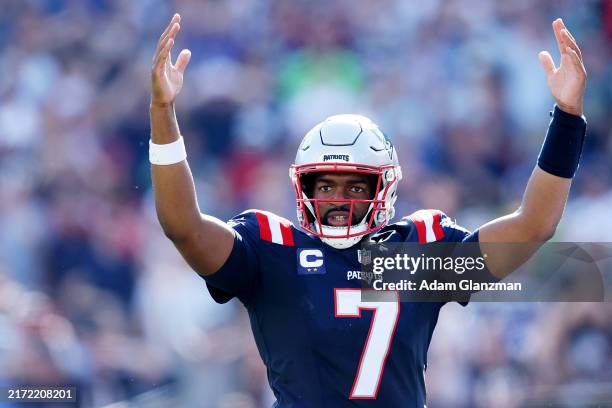 Jacoby Brissett of the New England Patriots reacts after a touchdown during the third quarter against the Seattle Seahawks at Gillette Stadium on...