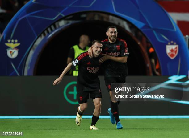 Orkun Kokcu celebrates after scoring a goal with Kerem Akturkoglu of SL Benfica during the UEFA Champions League 2024/25 League Phase MD1 match...