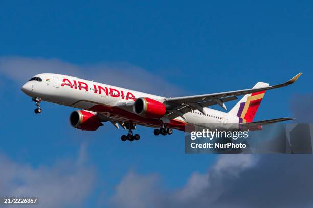 Air India Airbus A350-900 aircraft spotted flying for landing at the runway of London Heathrow Airport LHR in the United Kingdom. The modern and...