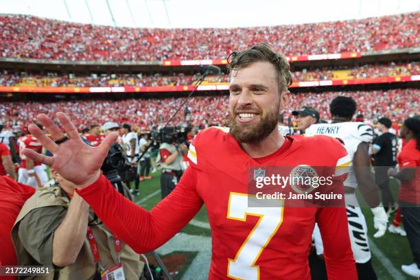 Harrison Butker of the Kansas City Chiefs celebrates after defeating the Cincinnati Bengals at GEHA Field at Arrowhead Stadium on September 15, 2024...
