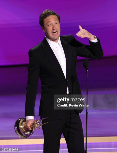 Ebon Moss-Bachrach accepts the Outstanding Supporting Actor in a Comedy Series award for “The Bear” onstage during the 76th Primetime Emmy Awards at...