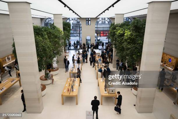 People line up outside Apple Store to purchase Apple's new iPhone 16 on Regent Street in London, United Kingdom on September 20, 2024.