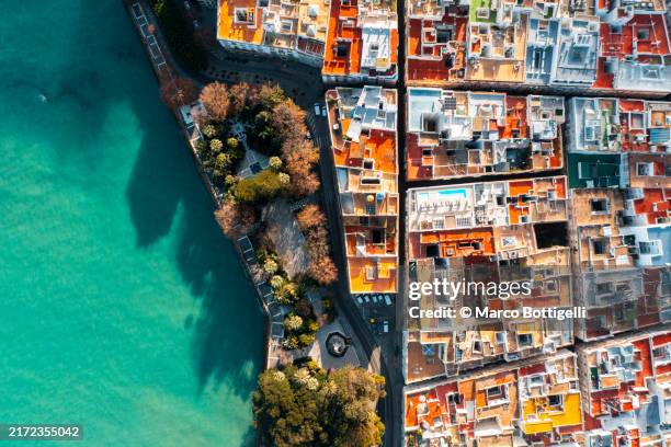overhead view of colorful coastal cityscape - spagna foto e immagini stock