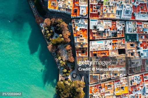 Overhead view of colorful coastal cityscape Overhead view of colorful coastal cityscape