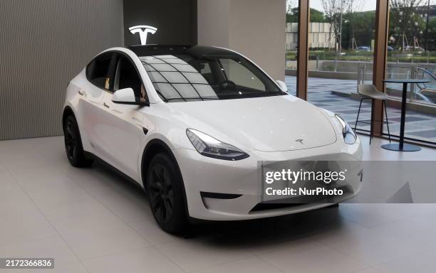 New electric car is displayed at a new Tesla store in Shanghai, China, on August 9, 2024.