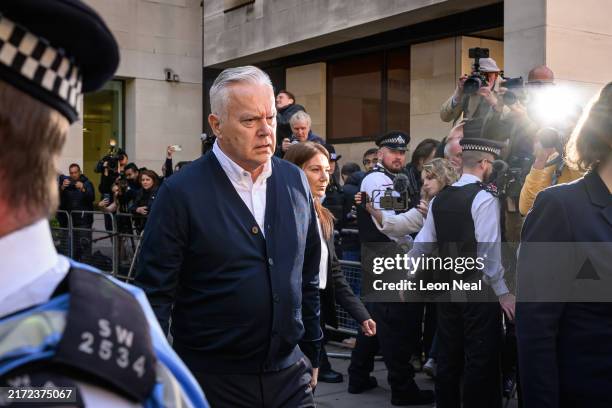 Former BBC broadcaster Huw Edwards leaves court after receiving a six-month jail sentence suspended for two years for accessing indecent images of...