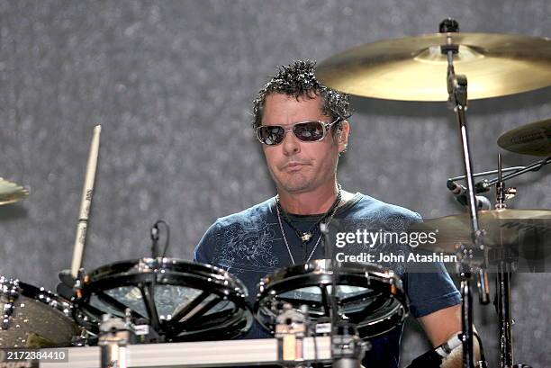 Drummer Jon Farriss is shown performing on stage during a live concert appearance with INXS on May 4, 2006 in Wallingford, Connecticut.