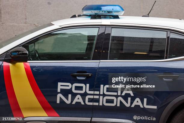 September 2024, Spain, Madrid: A Policia Nacional patrol car is parked in a street in Madrid. Photo: Jan Woitas/dpa