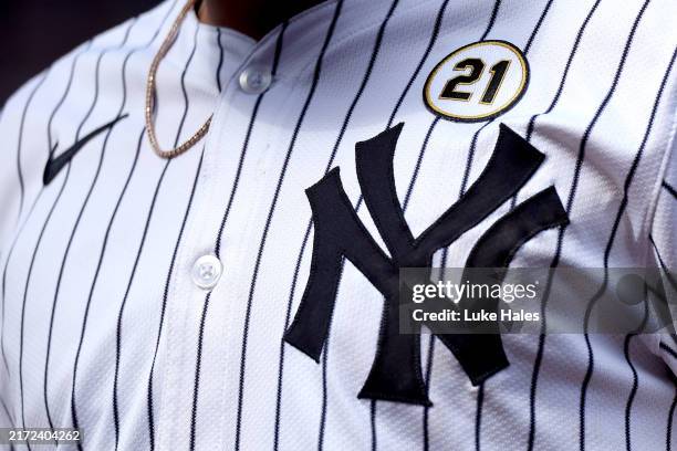 Detailed view of a Roberto Clemente 21 patch on the jersey of a New York Yankees against the Boston Red Sox at Yankee Stadium on September 15, 2024...