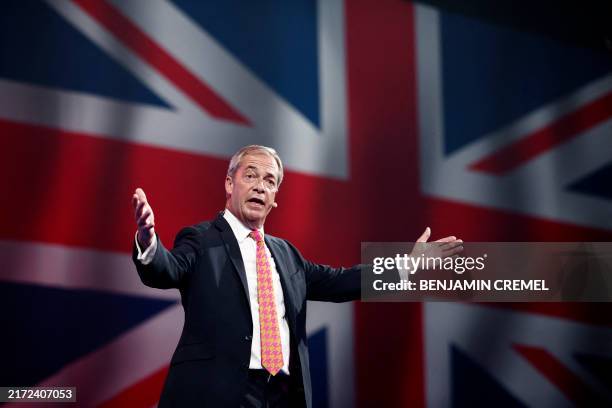 Reform UK party leader Nigel Farage delivers a speech on the opening day of the Reform UK 2024 annual Party Conference in Birmingham on September 20,...