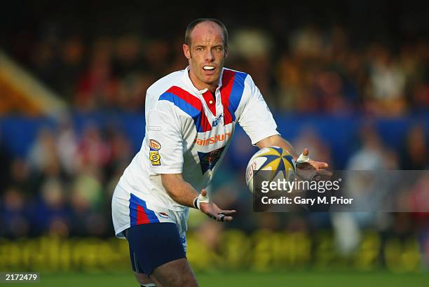 Martyn Holland of Wakefield Trinity Wildcats passes the ball during the Tetley's Bitter Super League match between the Wakefield Trinity Wildcats and...
