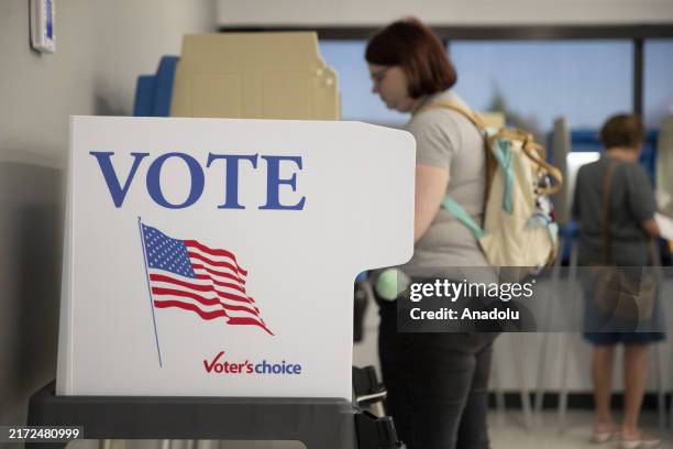 People arrive to cast their vote during the early voting for presidential race and local elections in Minnesota, United States on September 20, 2024.