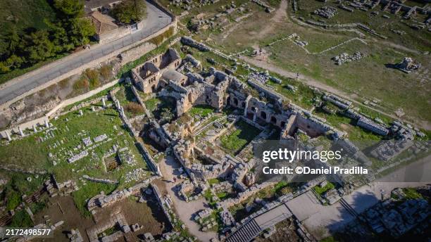 fountain of peirene in ancient corinth, greece - templo de apolo corinto imagens e fotografias de stock