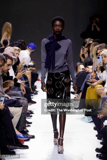 Model is seen on the catwalk at the Prada fashion show during Milan Fashion Week, September 19 2023.