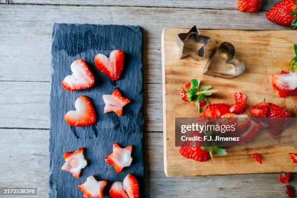 short strawberries with heart and stars molds - cross section stock pictures, royalty-free photos & images