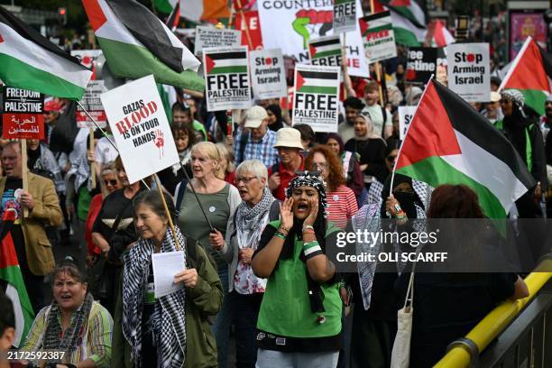 Pro-Palestinian protesters take part in the "National March to Labour's Conference: End the Genocide in Gaza Stop Arming Israel" on the eve of...