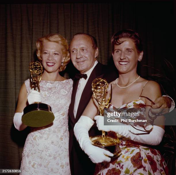 American singer Dinah Shore, American entertainer Jack Benny and American actress Ann B. Davis attend the 11th Primetime Emmy Awards, 6th May 1959....