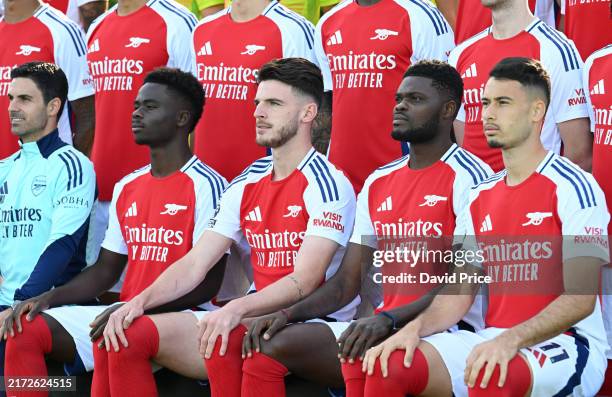 Bukayo Saka, Declan Rice, Thomas Partey and Gabriel Martinelli of Arsenal during the Arsenal Men's Squad Photograph at Sobha Realty Training Centre...