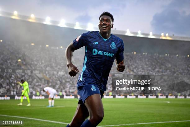 Porto's Spanish forward Samuel Omorodion celebrates his second goal during the Portuguese league football match between Vitoria Guimaraes SC and FC...