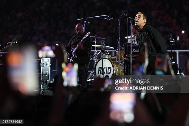British musician Liam Gallagher performs before the heavyweight boxing match for the IBF world title between Britain's Daniel Dubois and Britain's...