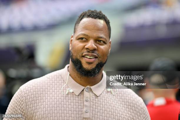 Former NFL star, Ndamukong Suh, looks on before the game between the Minnesota Vikings and the San Francisco 49ers at U.S. Bank Stadium on September...