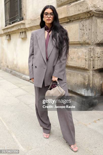 Dixie D'Amelio arrives at the Boss fashion show during the Milan Womenswear Spring/Summer 2025 on September 18, 2024 in Milan, Italy.