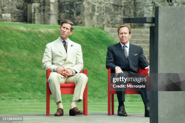 Prince Charles sitting with Antony, Earl of Snowdon. Caernarfon, Gwynedd, Wales. 1st July 1994. Prince Charles attends a garden party at Caernarfon...