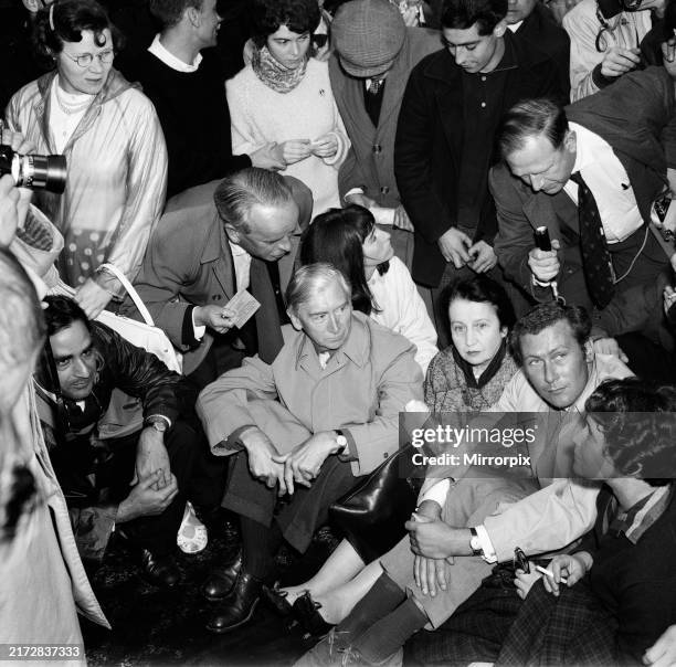 The angry young man playwright, John Osborne, second from the right, sits it out with top demonstrators, publisher Sir Herbert Read, centre, Lady...