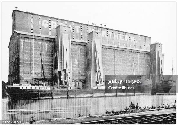 antique image: great northern, buffalo, grain elevator - lake dock stock illustrations