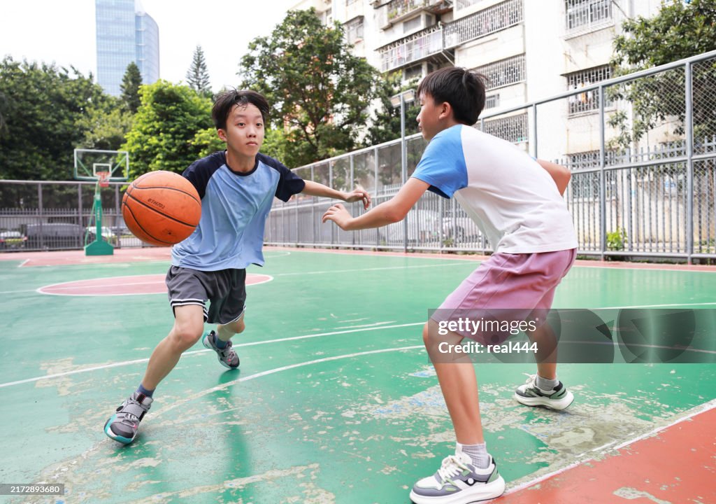 Junior basketball players on the court