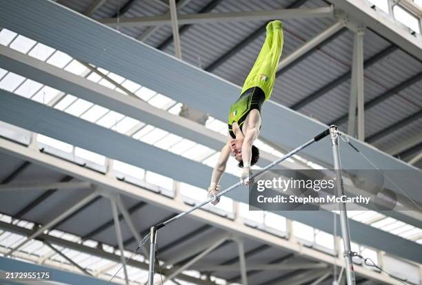 Dublin , Ireland - 22 September 2024; Oisin O'Connell of Ireland competes in the final of the horizontal bar event during day two of the Gymnastics...