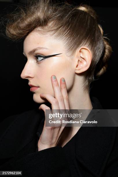 Model is seen backstage at the Antonio Marras fashion show during the Milan Womenswear Spring/Summer 2025 on September 18, 2024 in Milan, Italy.