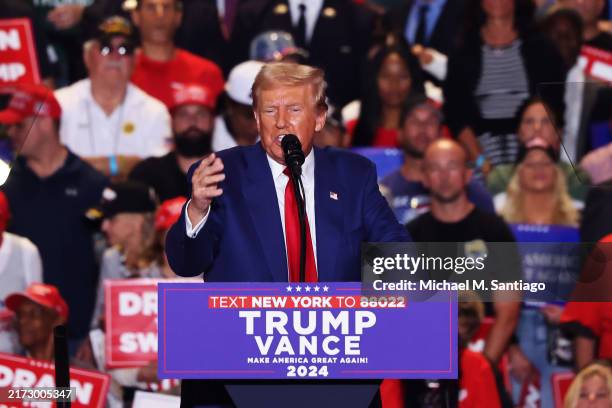 Republican presidential nominee, former U.S. President Donald Trump speaks during a campaign rally at Nassau Veterans Memorial Coliseum on September...